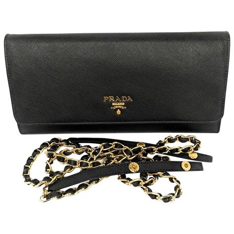 black and gold prada wallet|prada wallet on chain black.